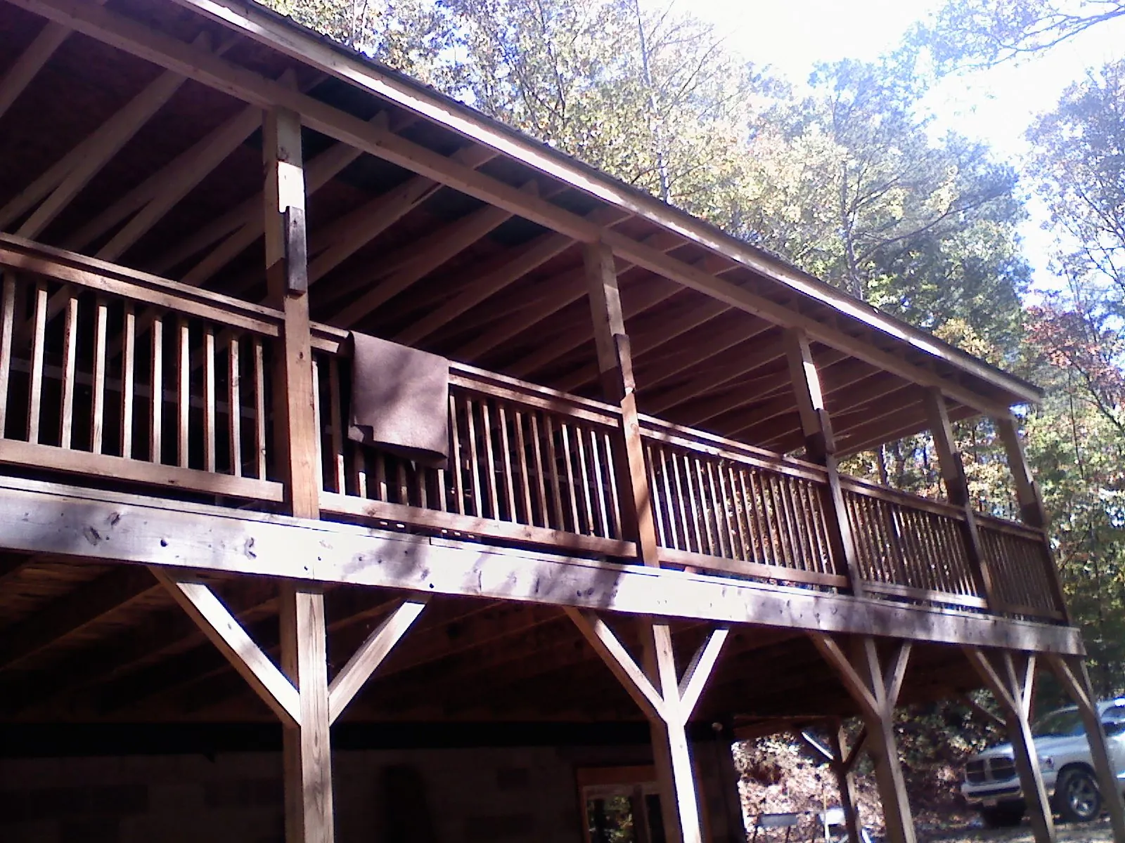 Timber framing under a new elevated porch and deck — Roof Leak Repair in Hoskins by Roofing Brothers